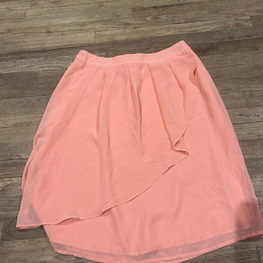 Downeast skirt crisscross design in front. Size is small